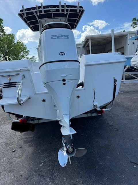 White boat with Suzuki 225hp repower
