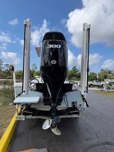 Suzuki 300 outboard motor on black boat